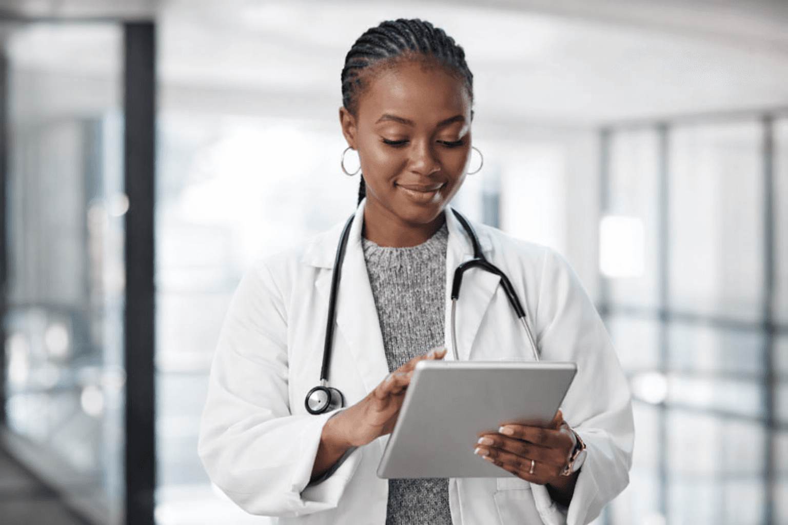 Doctor using AfyaBooking AI