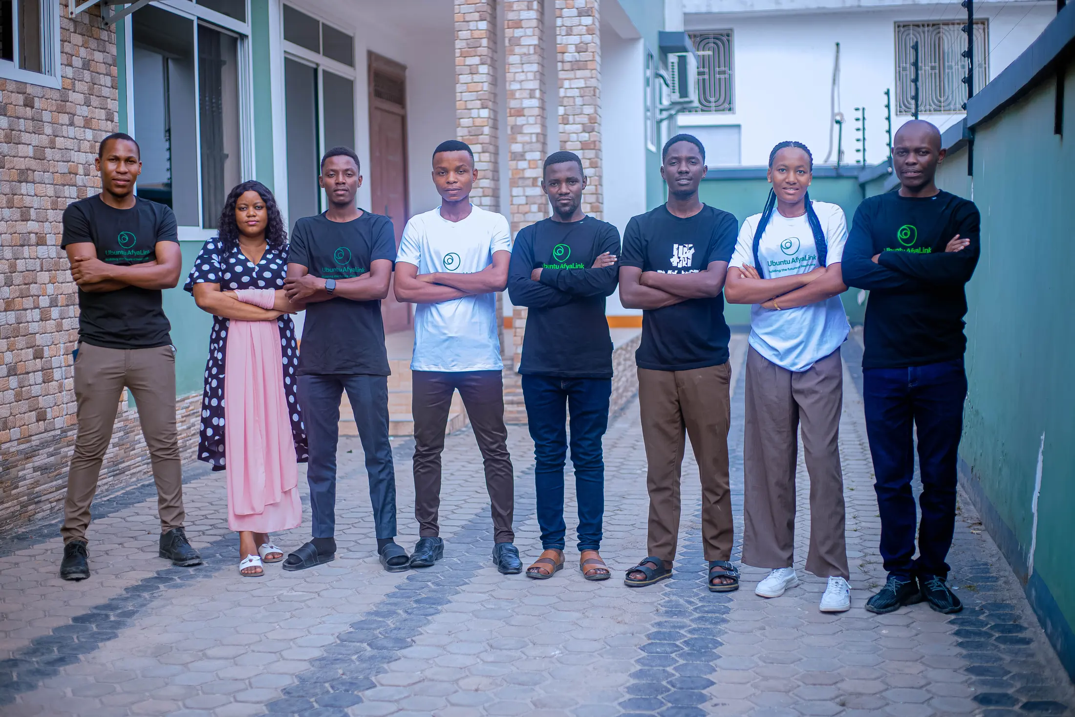 The Ubuntu AfyaLink team with arms crossed